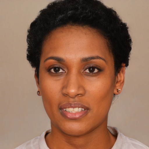 Neutral black young-adult female with short  black hair and brown eyes