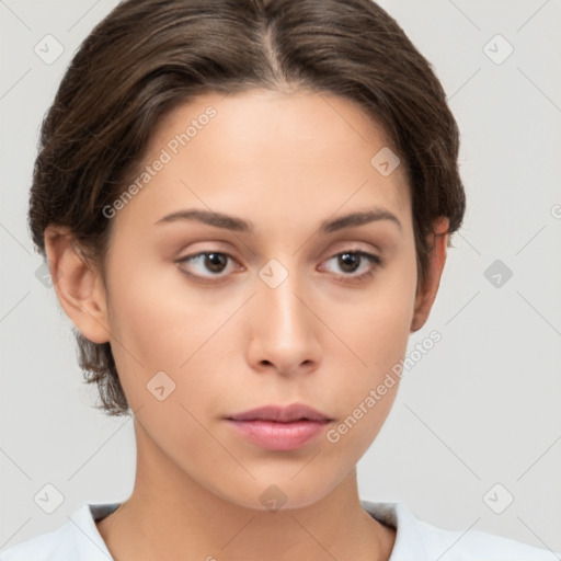 Neutral white young-adult female with short  brown hair and brown eyes