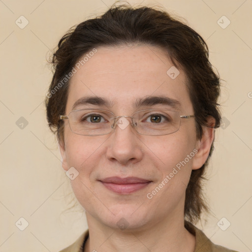 Joyful white adult female with medium  brown hair and brown eyes