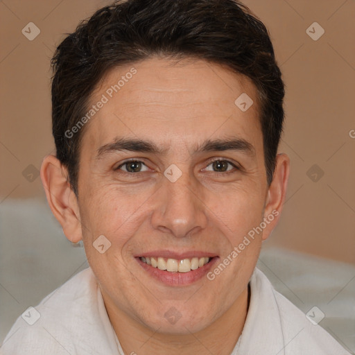 Joyful white adult male with short  brown hair and brown eyes