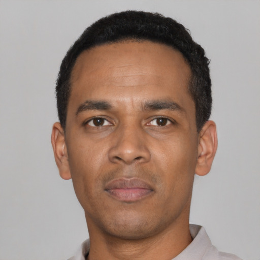 Neutral black young-adult male with short  black hair and brown eyes