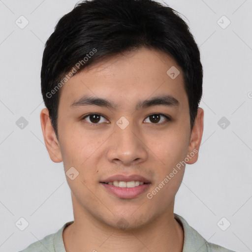 Joyful asian young-adult male with short  black hair and brown eyes