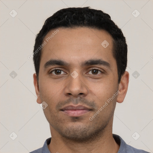 Neutral latino young-adult male with short  black hair and brown eyes