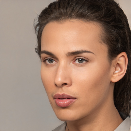 Neutral white young-adult female with medium  brown hair and brown eyes