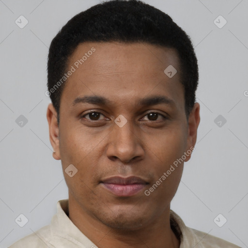 Joyful black young-adult male with short  brown hair and brown eyes