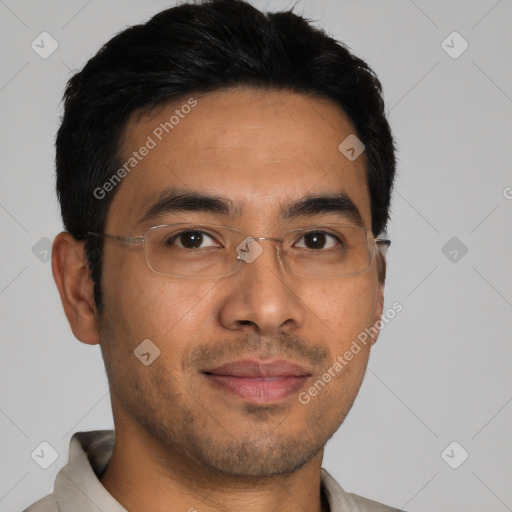 Joyful asian young-adult male with short  black hair and brown eyes