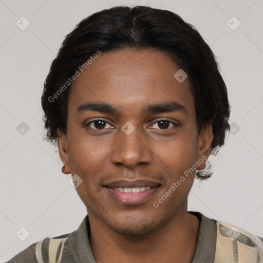 Joyful black young-adult male with short  black hair and brown eyes