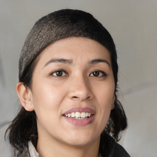 Joyful white young-adult female with medium  black hair and brown eyes