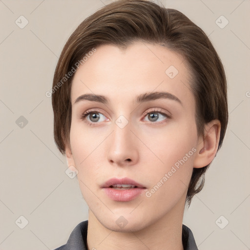 Neutral white young-adult female with medium  brown hair and grey eyes