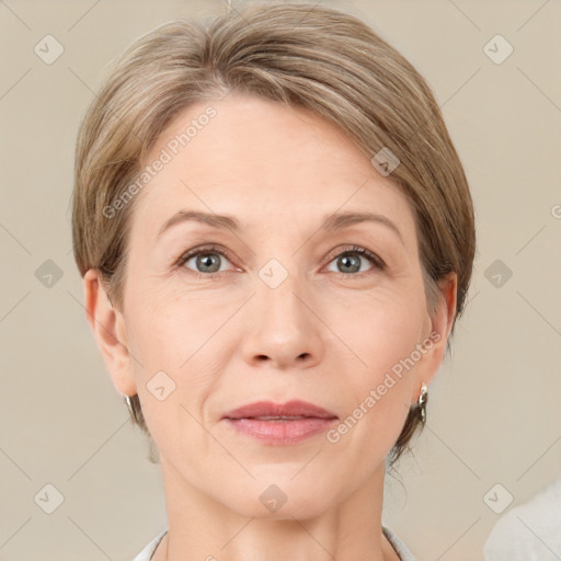 Joyful white adult female with medium  brown hair and grey eyes