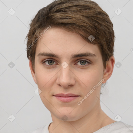 Joyful white young-adult female with short  brown hair and grey eyes