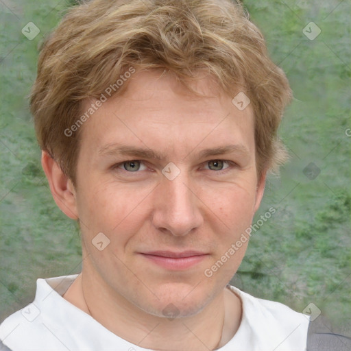 Joyful white adult male with short  brown hair and grey eyes