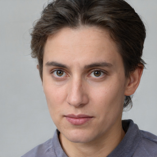 Joyful white young-adult male with medium  brown hair and brown eyes