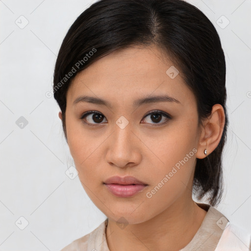 Neutral asian young-adult female with medium  brown hair and brown eyes