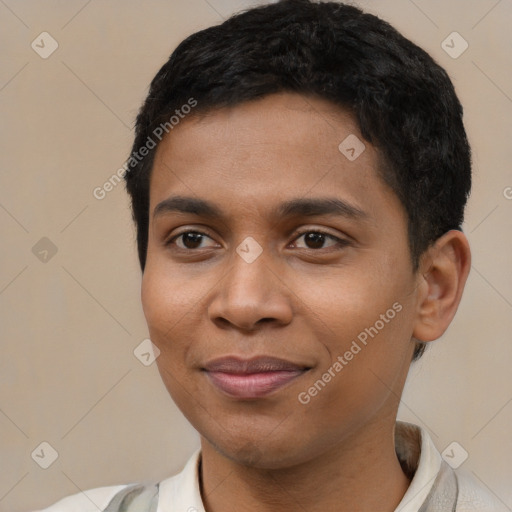 Joyful latino young-adult male with short  black hair and brown eyes