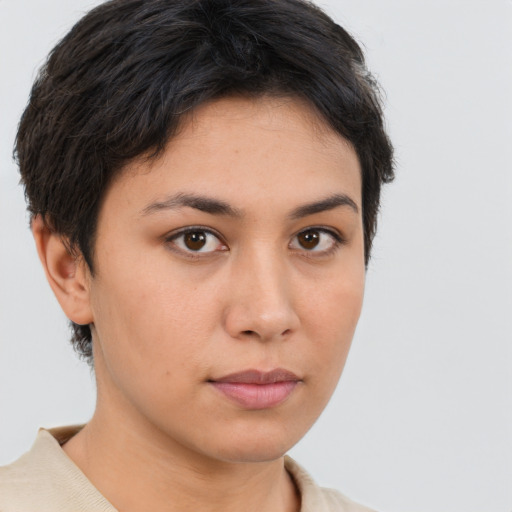 Neutral white young-adult female with short  brown hair and brown eyes