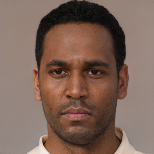 Neutral black young-adult male with short  black hair and brown eyes