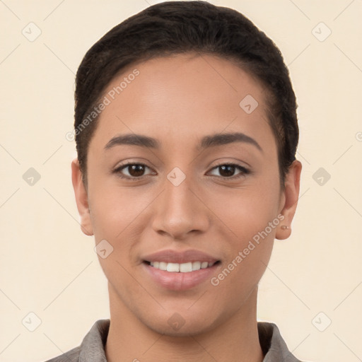 Joyful white young-adult female with short  brown hair and brown eyes