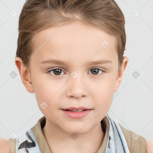 Joyful white child female with short  brown hair and brown eyes