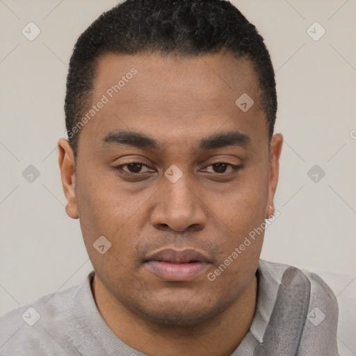 Neutral latino young-adult male with short  black hair and brown eyes