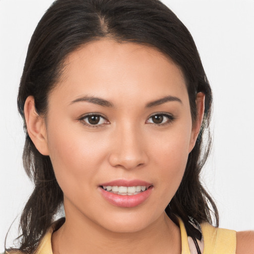 Joyful white young-adult female with medium  brown hair and brown eyes