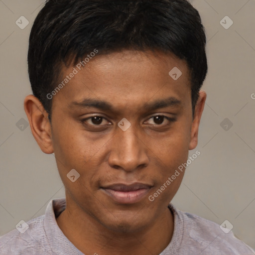 Joyful latino young-adult male with short  brown hair and brown eyes