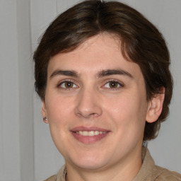 Joyful white young-adult female with medium  brown hair and grey eyes