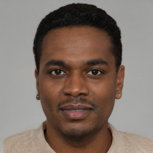 Neutral black young-adult male with short  black hair and brown eyes
