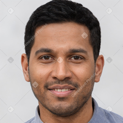 Joyful latino young-adult male with short  black hair and brown eyes