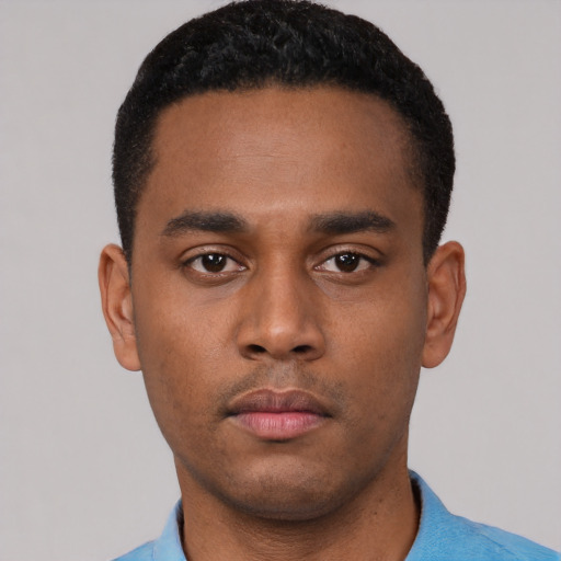Neutral black young-adult male with short  black hair and brown eyes
