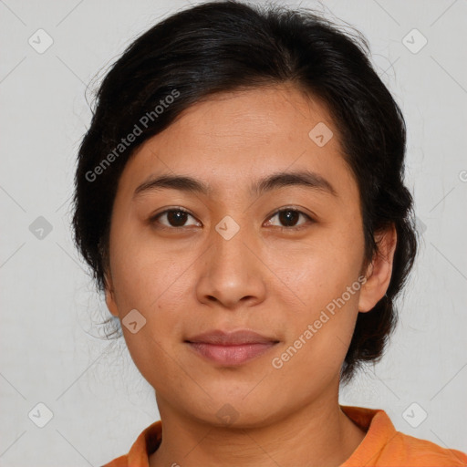 Joyful asian young-adult female with medium  brown hair and brown eyes