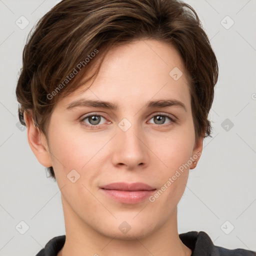 Joyful white young-adult female with short  brown hair and grey eyes