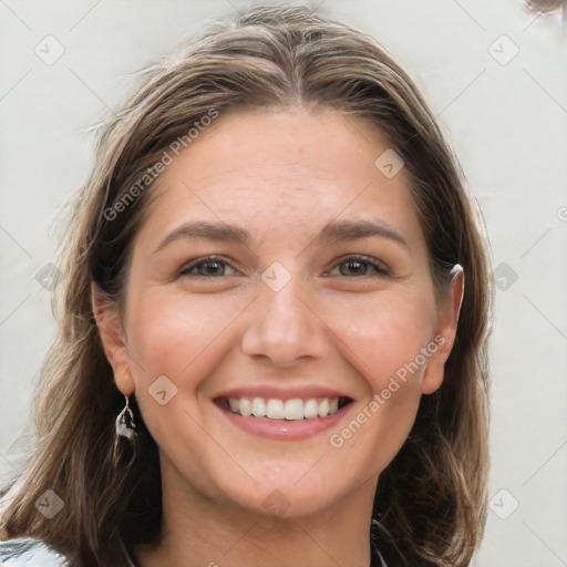 Joyful white young-adult female with long  brown hair and grey eyes