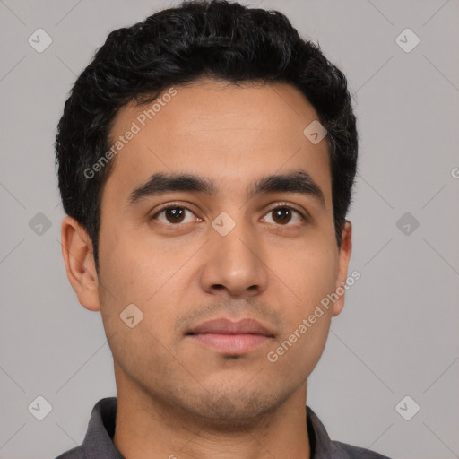 Neutral latino young-adult male with short  black hair and brown eyes