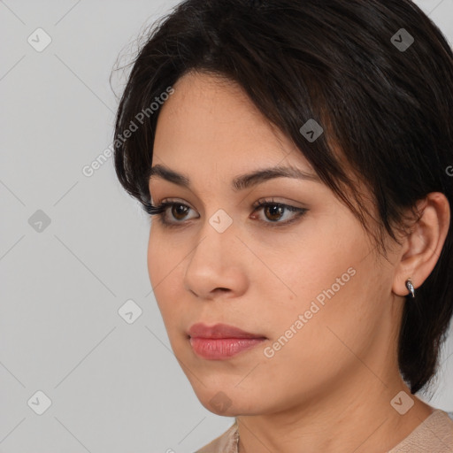 Neutral white young-adult female with medium  brown hair and brown eyes