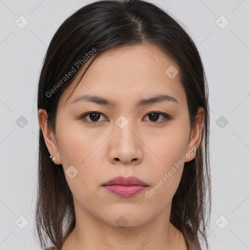 Neutral asian young-adult female with medium  brown hair and brown eyes