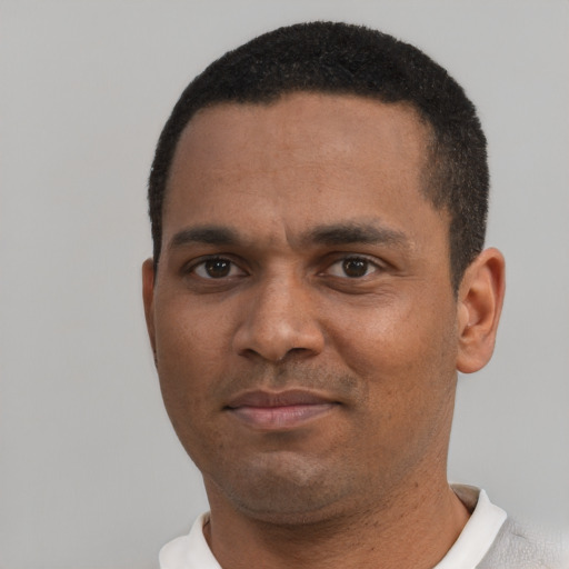 Neutral black young-adult male with short  brown hair and brown eyes