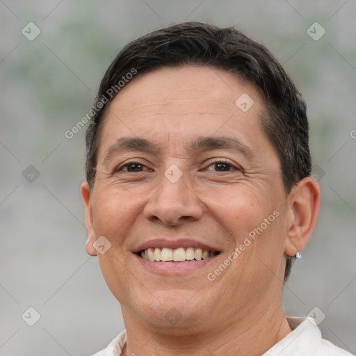 Joyful white adult male with short  brown hair and brown eyes