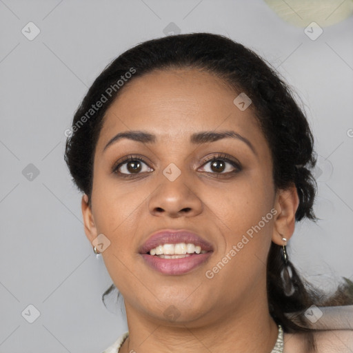 Joyful latino young-adult female with short  black hair and brown eyes