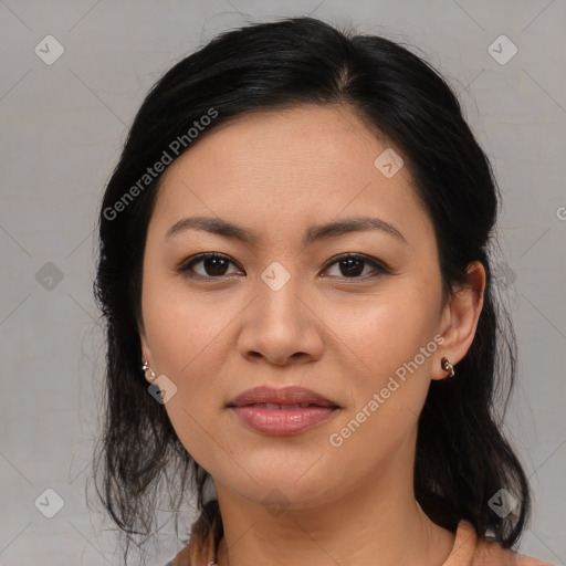 Joyful asian young-adult female with medium  brown hair and brown eyes