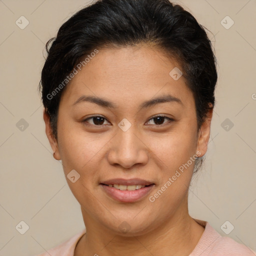 Joyful latino young-adult female with short  brown hair and brown eyes