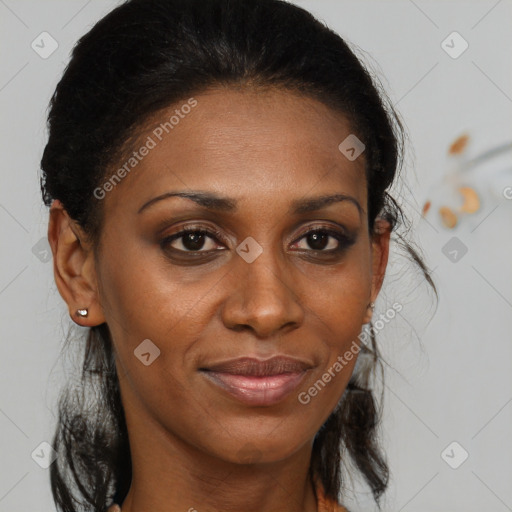 Joyful black adult female with medium  brown hair and brown eyes