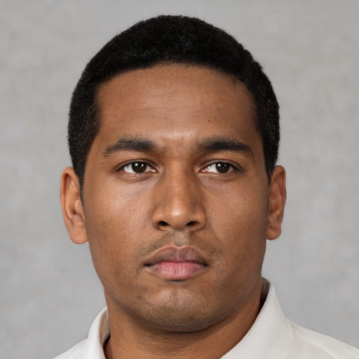 Neutral black young-adult male with short  black hair and brown eyes