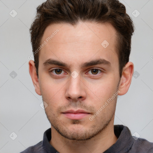 Neutral white young-adult male with short  brown hair and grey eyes