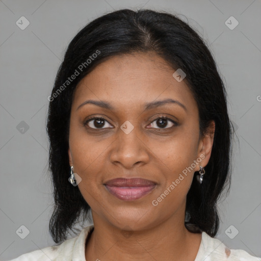 Joyful black young-adult female with medium  brown hair and brown eyes