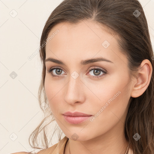 Neutral white young-adult female with long  brown hair and brown eyes