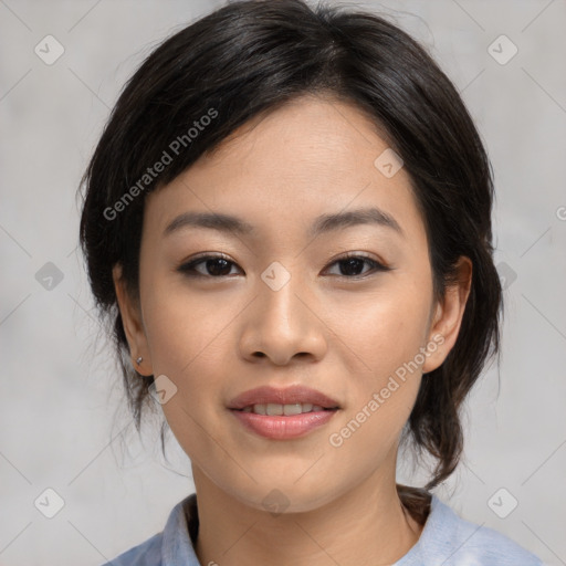 Joyful asian young-adult female with medium  black hair and brown eyes