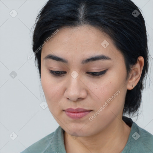 Joyful asian young-adult female with medium  brown hair and brown eyes