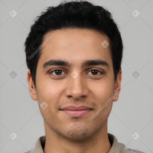 Joyful latino young-adult male with short  black hair and brown eyes