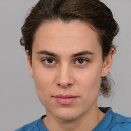 Neutral white young-adult female with short  brown hair and brown eyes